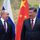 Chinese President Xi Jinping (d) receives his Russian counterpart Vladimir Putin in Beijing on February 4, 2022.