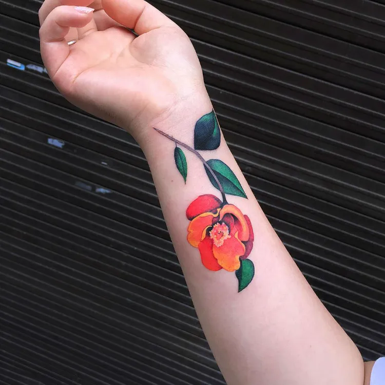 tattoo 2022 trend color forearm handle woman flower