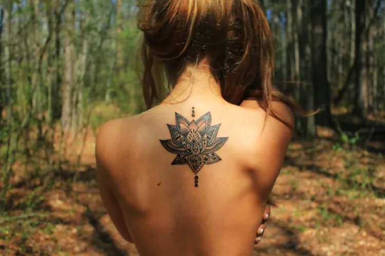 tattoo 2022 trend spiritual style lotus symbol protection tattoo