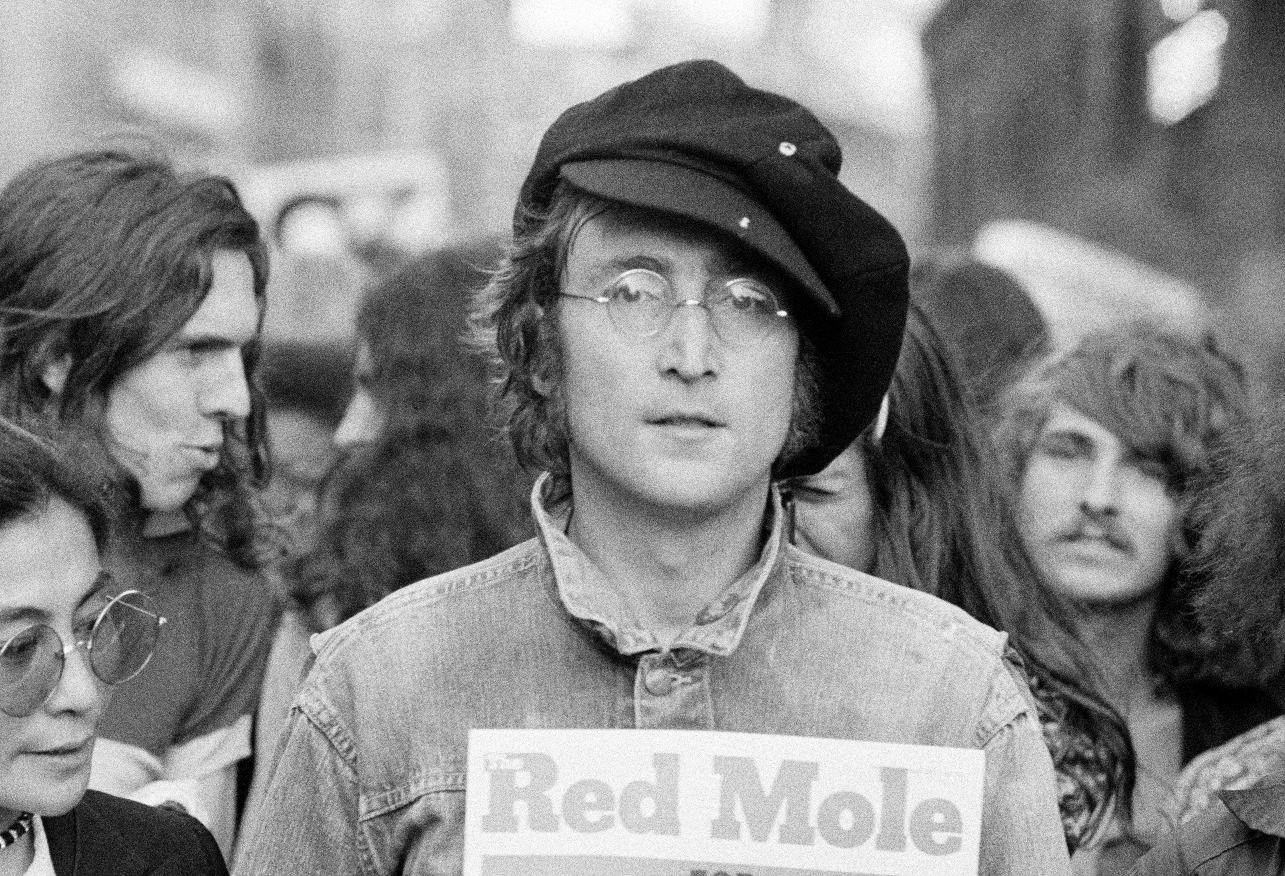 John Lennon and Yoko Ono (to his left) in London's Hyde Park, 1975 (Photo: Rowland Scherman/Getty Images)