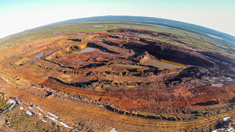 Aerial view of a mining basin in nature.
