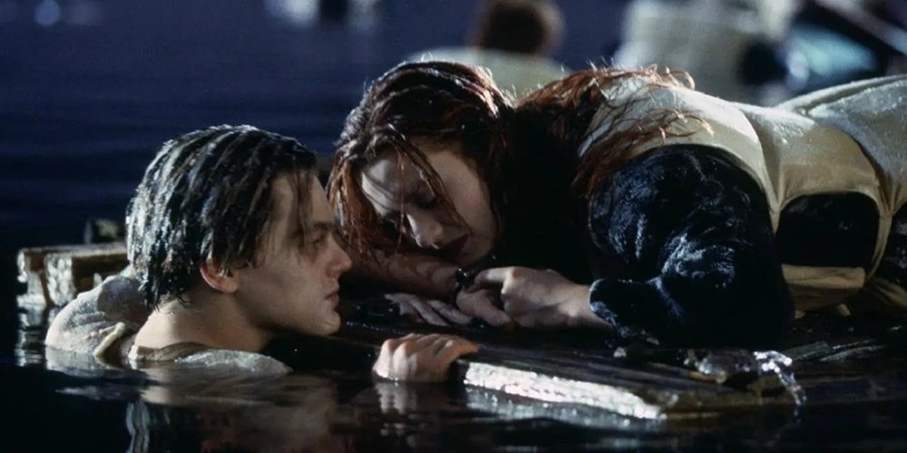 Leonardo DiCaprio as Jack and Kate Winslet as Rose on the wooden door at the end of Titanic.